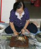 Grandma hacking up the crabs